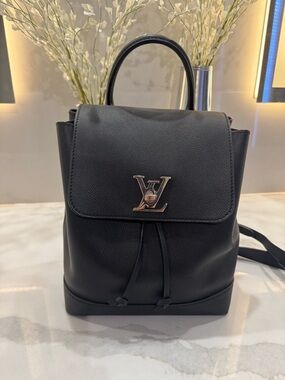 Black Louis Vuitton Leather Backpack with silver Logo